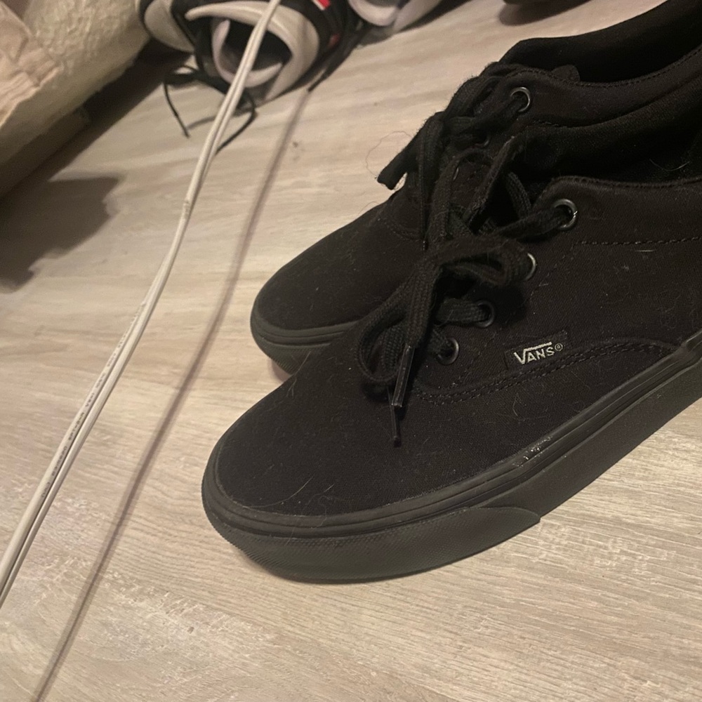 Black Vans. Worn only once. Great condition. No box